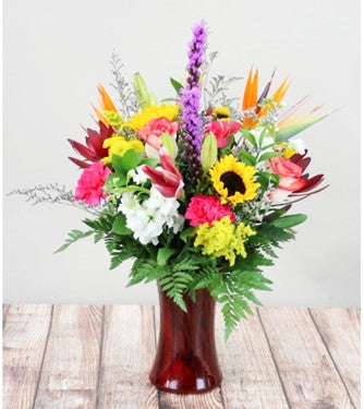 Rainbow Glow-Vibrant rainbow-colored bouquet for a magical touch